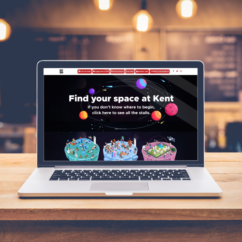 A mockup of a laptop on a desk displaying a website design. The graphics on the webpage are space related, planets and asteroids etc, and the banner reads 'Find your space at Kent'. This was the landing page for the Kent Union Virtual Welcome Back Fair 2021.